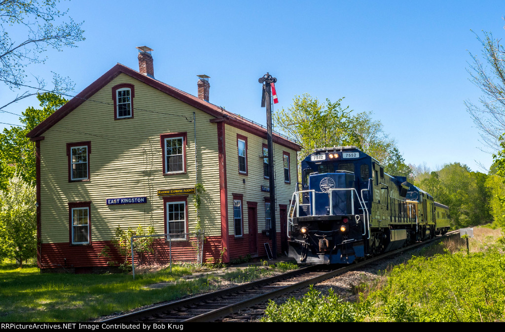 PAR 7552 leads a joint Pan Am / CSX inspectnon train past the former Boston & Maine depot in South Kingston, NH